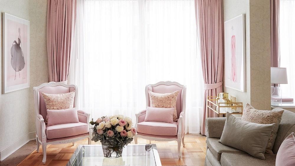 The Langham Melbourne Hotel Exterior photo A living room with a pink color scheme